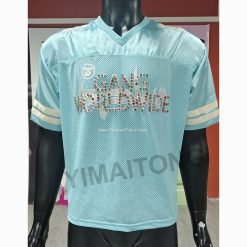 Custom streetwear boxy cropped rhinestone mesh t-shirt with rivet detailing and satin mesh panels in American retro football jersey style
