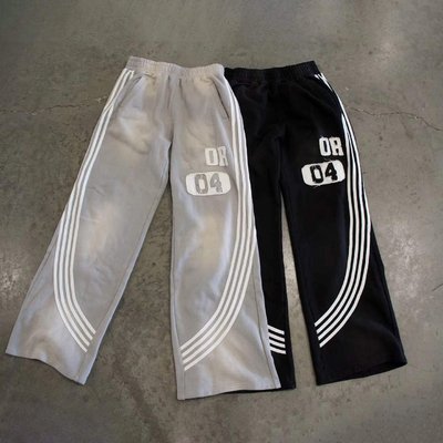 Men's windbreaker high waist sweatpants with side stripes and custom logo design in charcoal grey