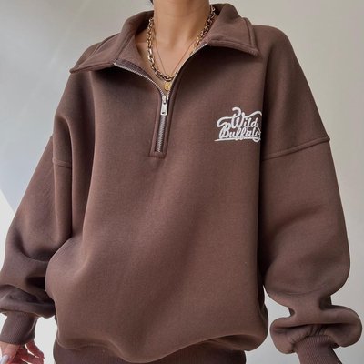 Women's oversized fleece zip-up hoodie in grey with front zip closure and kangaroo pocket, styled for casual yoga wear and comfortable everyday layering